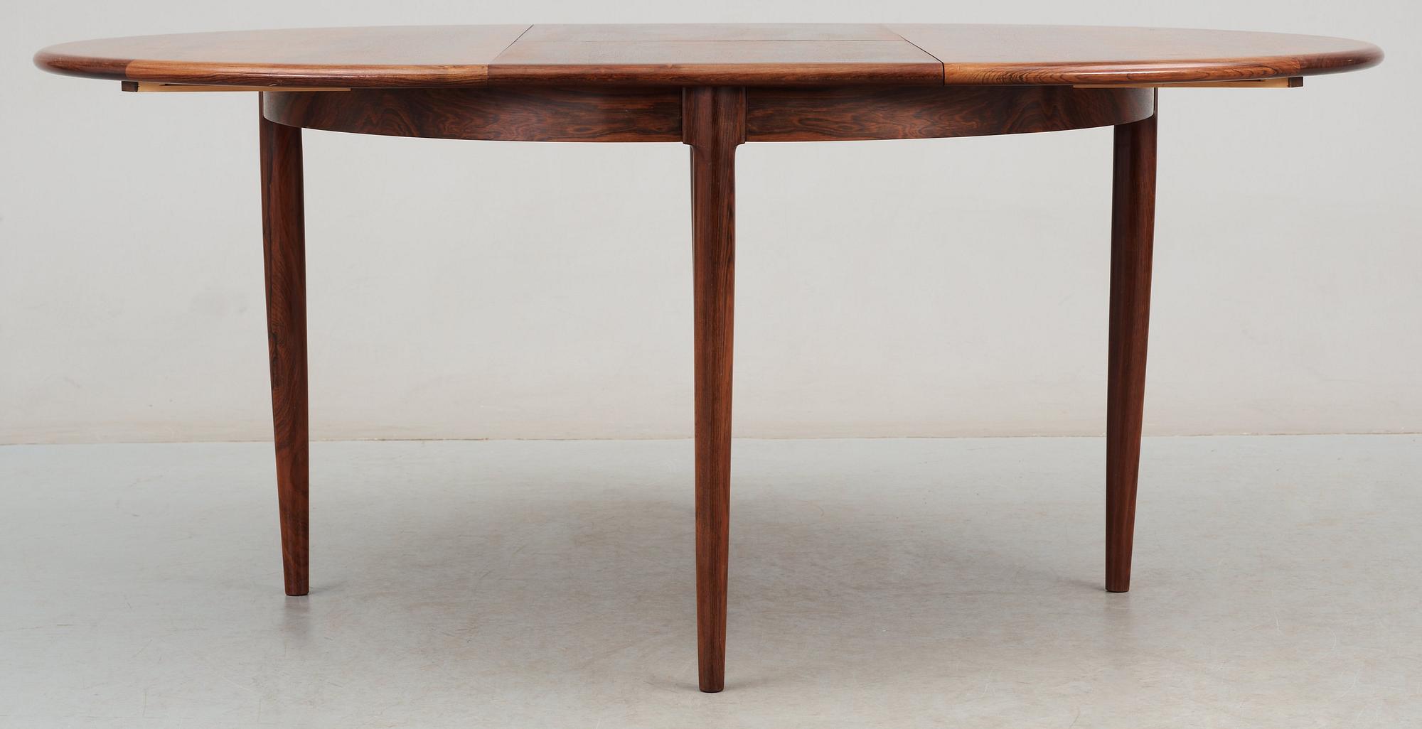 A Niels Ole Møller palisander dining table and nine chairs, J.L. Møller, Denmark 1950's-60's.