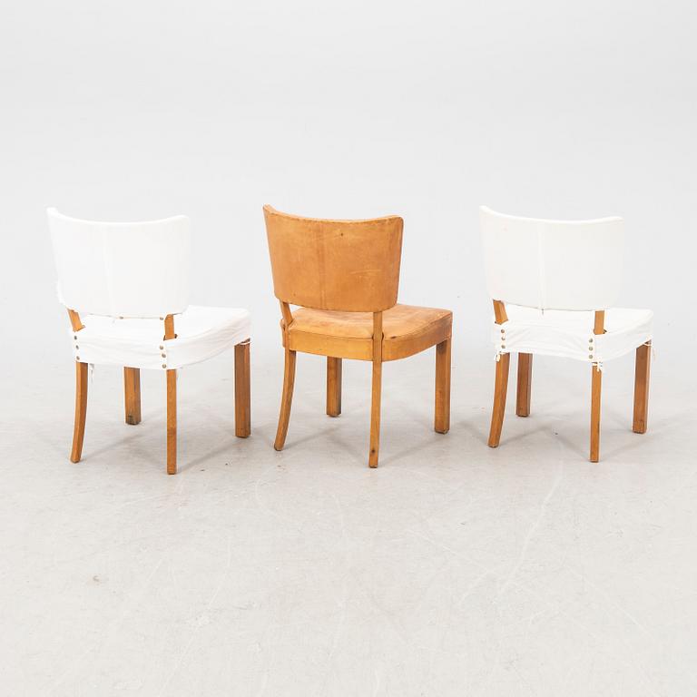 A set of seven + one leather chairs from Mobilia Malmö mid 1900s.