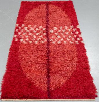 Edna Martin, a carpet, knotted pile, ca 262,5 x 94-97 cm, signed EM HAV (Edna Martin, Handarbetets Vänner).