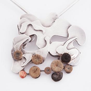 Inga-Britt "Ibe" Dahlquist, a silver and fossil necklace, Sweden.