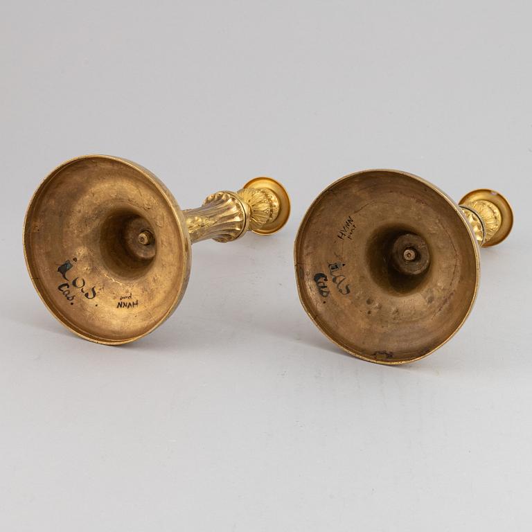 A pair of Louis XVI candlesticks.