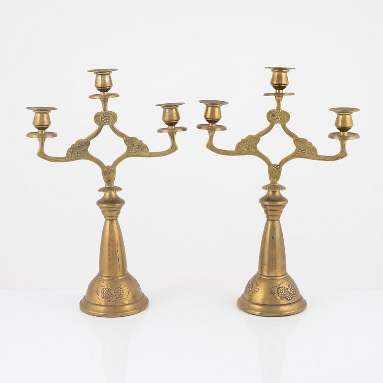 A pair of brass candelabra, Art Nouveau, early 20th century.