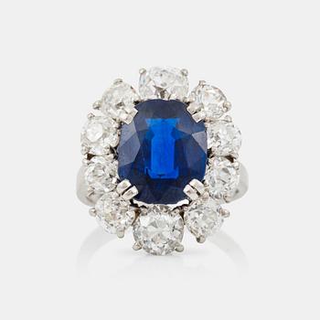 An untreated sapphire, circa 4.00 cts, and diamond ring. Signed Boucheron.