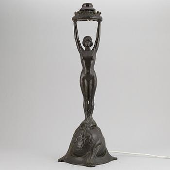 GERDA SPRINCHORN, an Art Nouveau green patinated bronze lamp "The Sun", Herman Bergman, Stockholm, early 20th century.