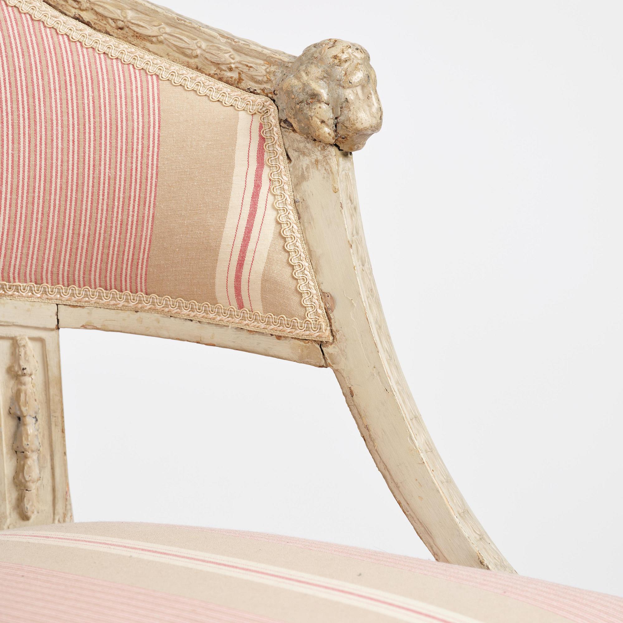 A pair of late Gustavian open.back armchairs, Stockholm, late 18th century.