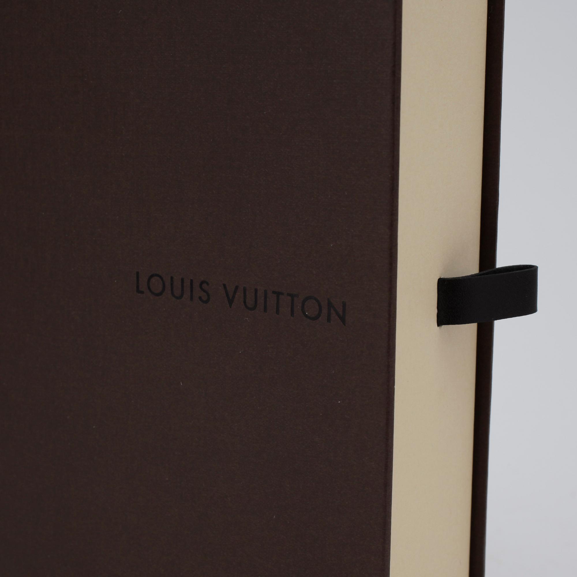 LOUIS VUITTON, a Monogram canvas agenda.