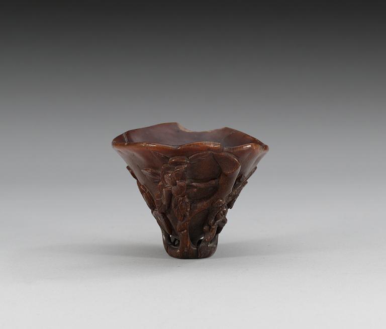 A rhinoceros horn libation cup, Qing dynasty, Kangxi (1662-1722).