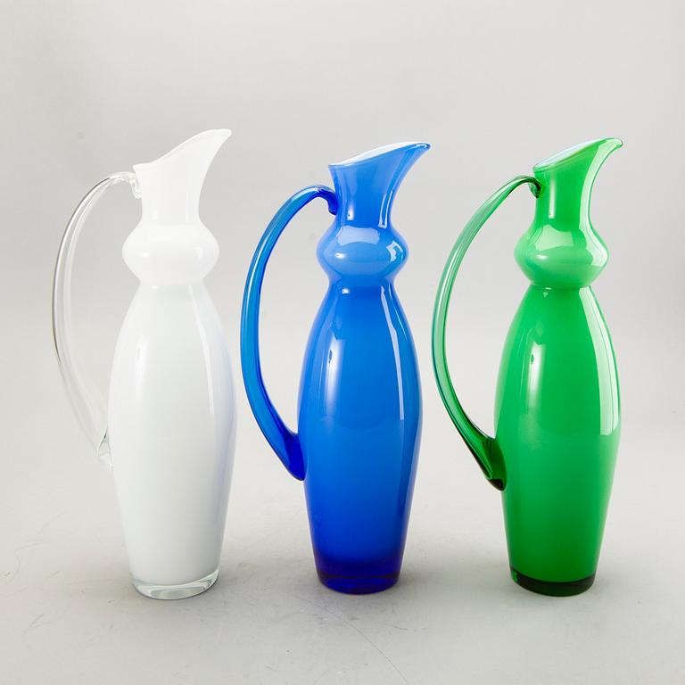 Anne Nilsson, a set of three glass decanters.