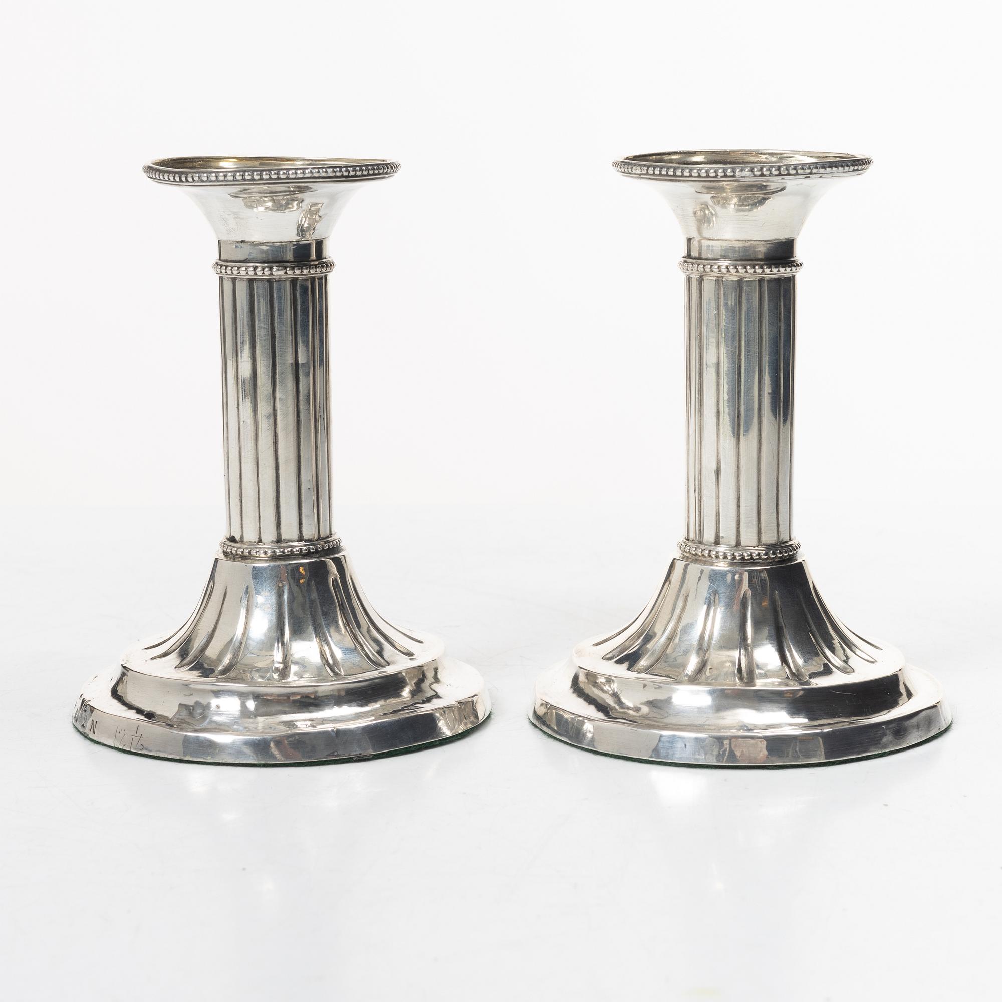A Swedish pair of 18th century Gustavian silver candlesticks, worn city and maker’s marks, Sweden 1795.