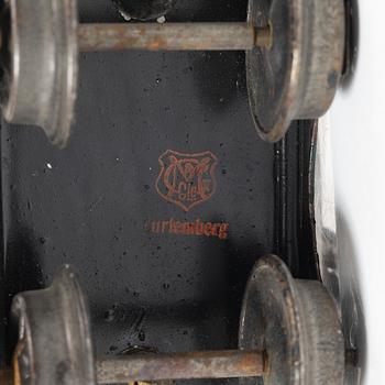 Model train with track and station building, 13 pieces, Germany, 1920s.