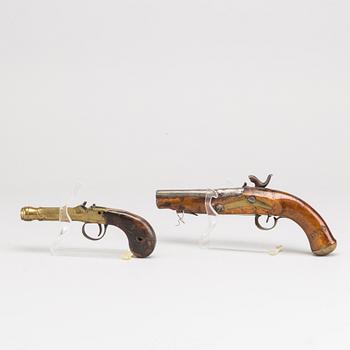 A SET OF 2 PERCUSSION LOCK PISTOLS.