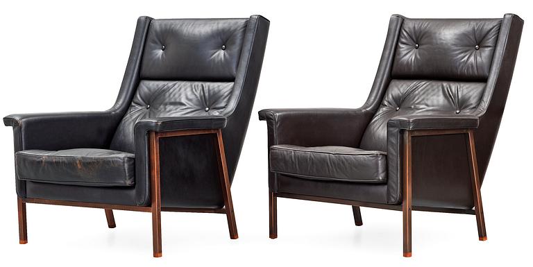 A pair of Karl- Erik Ekselius black leather armchairs, JOC, Vetlanda early 1960's.