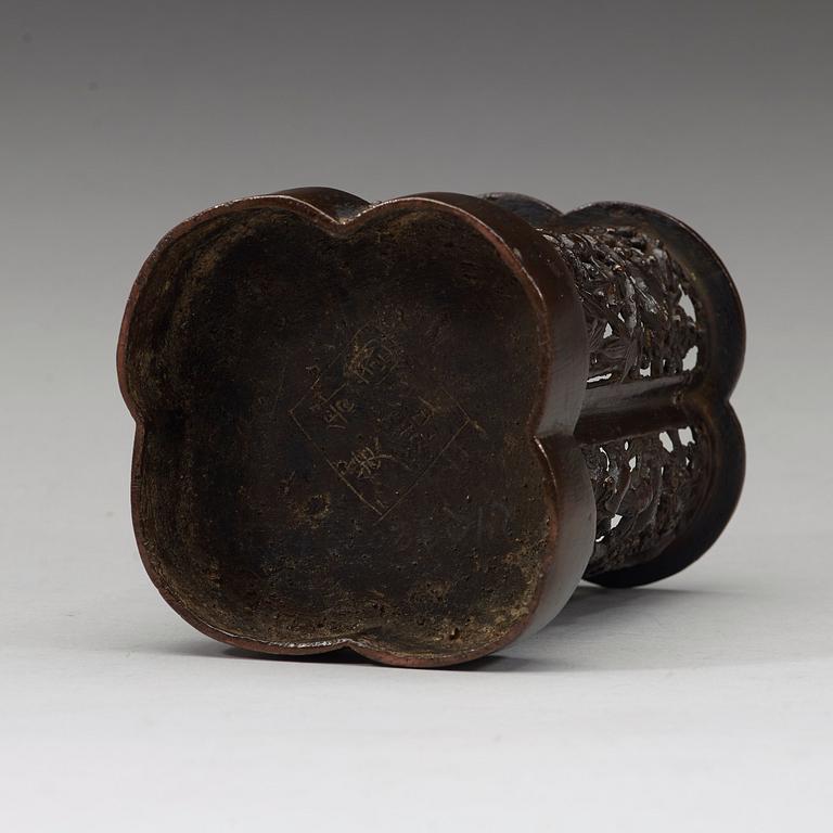 A bronze brush pot, Ming dynasty (1368-1643). With four characters mark.