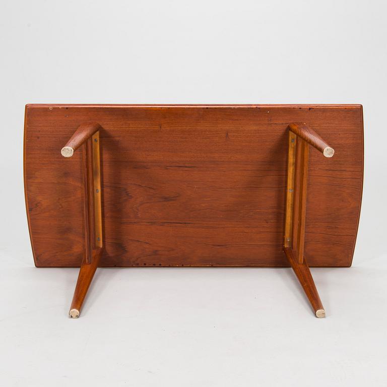A 1960s teak coffee table.