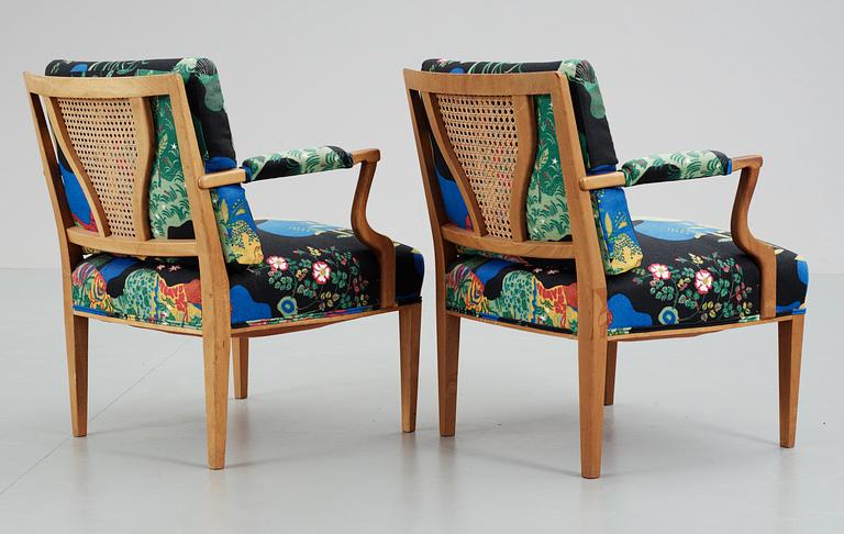 A pait of Josef Frank mahogany and rattan armchairs, Svenskt Tenn,