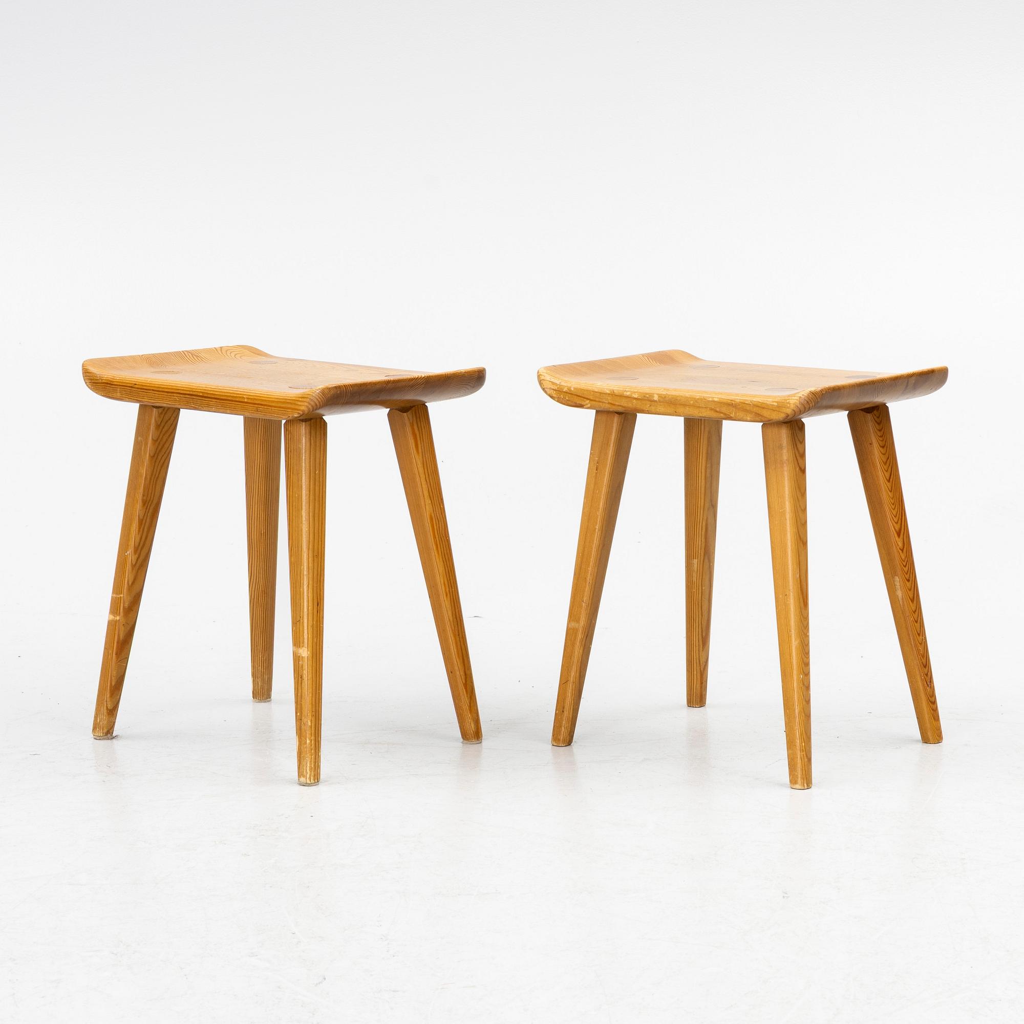 Carl Malmsten, a pair of "Visingsö" stools, Svensk Fur, second half of the 20th century.