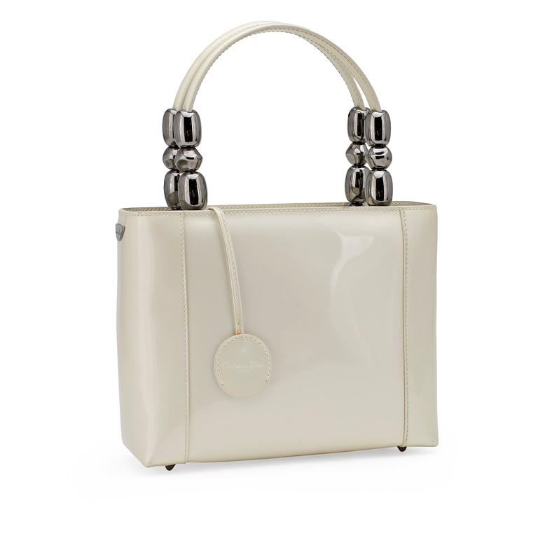 CHRISTIAN DIOR, a white patent leather handbag.