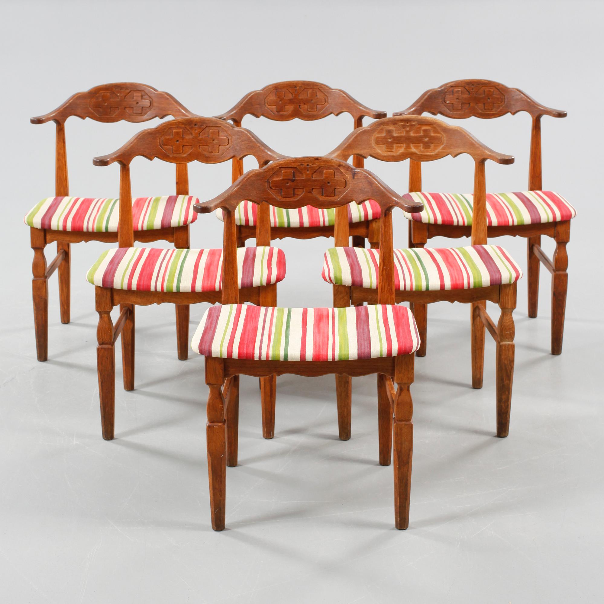 Six chairs designed by Henning Kjærnulf, made by EG Kvalitetsmøbler in the mid 20th century.