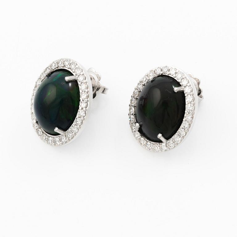 Earrings 18K white gold with opals and octagon-cut diamonds.