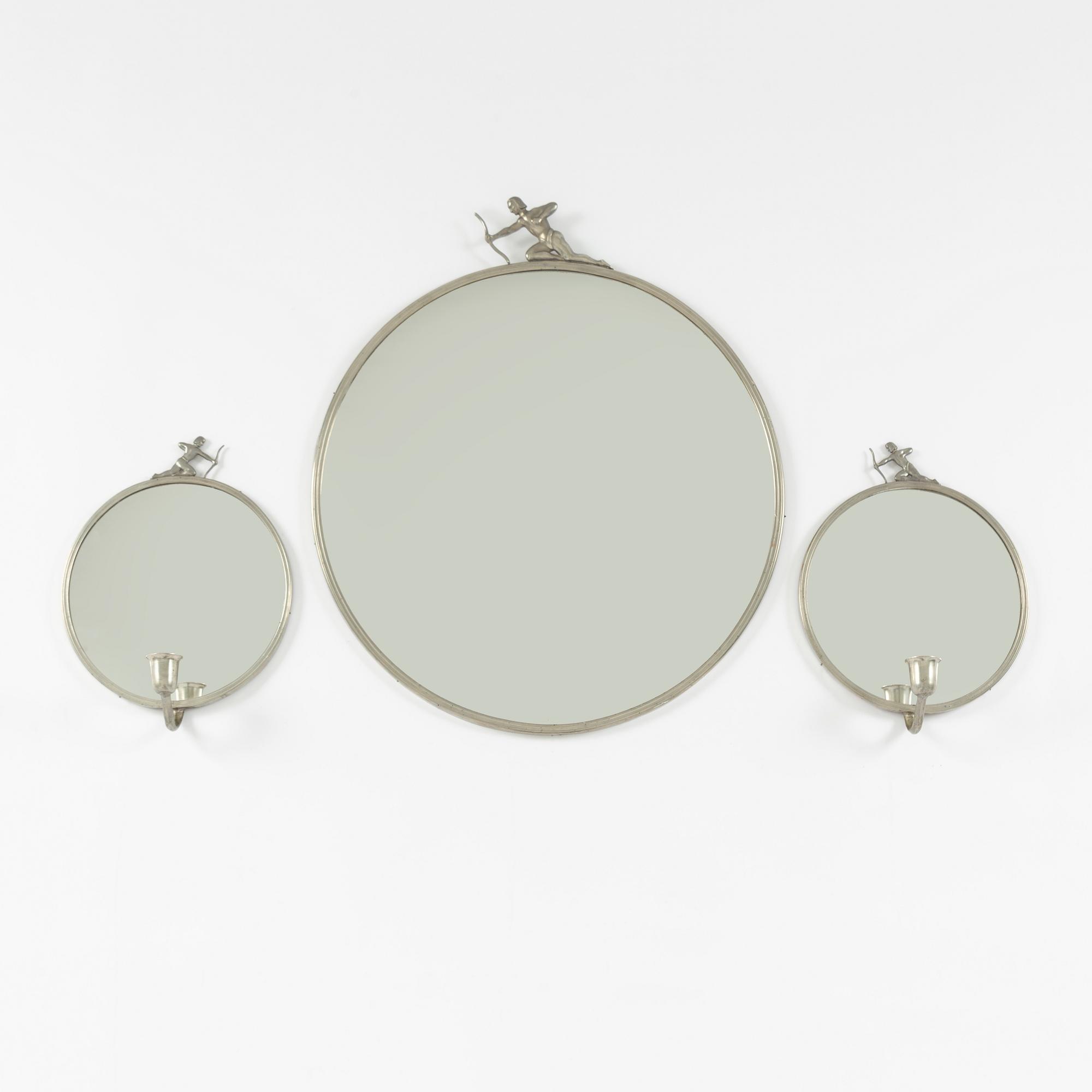 A Swedish grace mirror and a pair of wall sconces, 1930s.