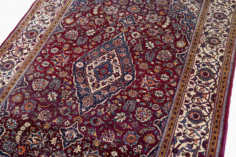 A semi-antique silk Keshan, 208 x 138 cm.