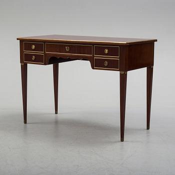 A 20th century late Gustavian style mahogany writing desk.