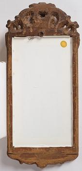 A Swedish gitlwood rococo mirror, Stockholm, later part 18th century.