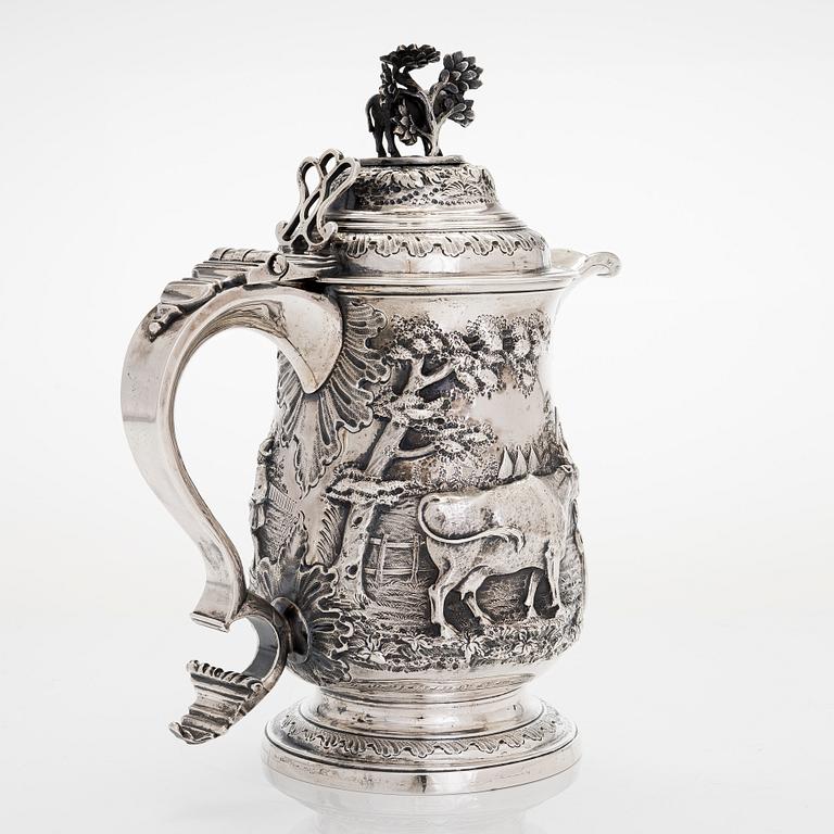 A George III sterling silver jug, maker's mark of John Deacon, London 1772.