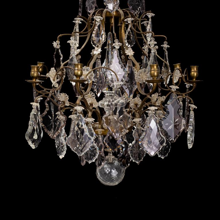 A Rococo-style eight-light chandelier, early 20th century.