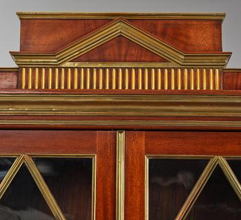 A pair of Russian mahogany and brass-mounted Jacob-style bibliothèques, modern with old parts.