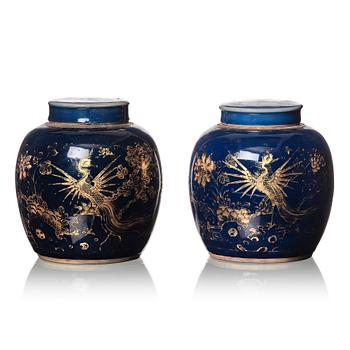 A pair of blue glazed Chinese jars with covers, Qing dynasty, Qianlong (1736-95).