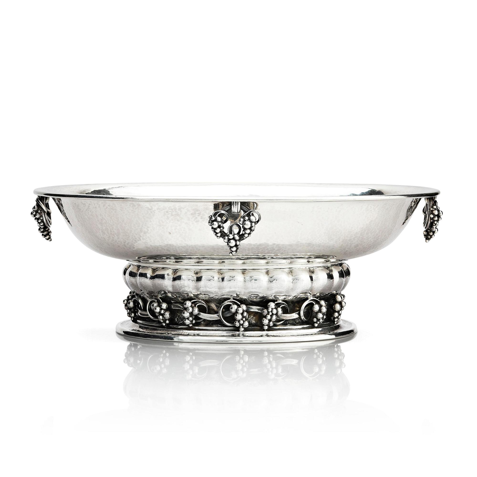 Georg Jensen, an 830/1000 silver centerpiece with grapes, Copenhagen 1925-32, design nr 296A from 1919.