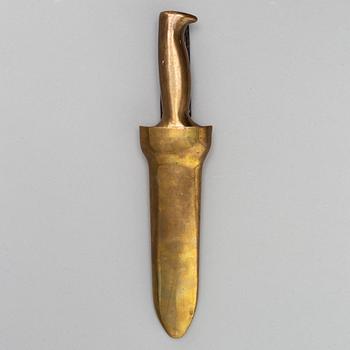 A brass diver's knife from C.E. Heinke & Co. Ltd., London, England.