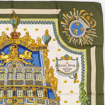 Hermès, a 'Le Soleil Royal' silk scarf.