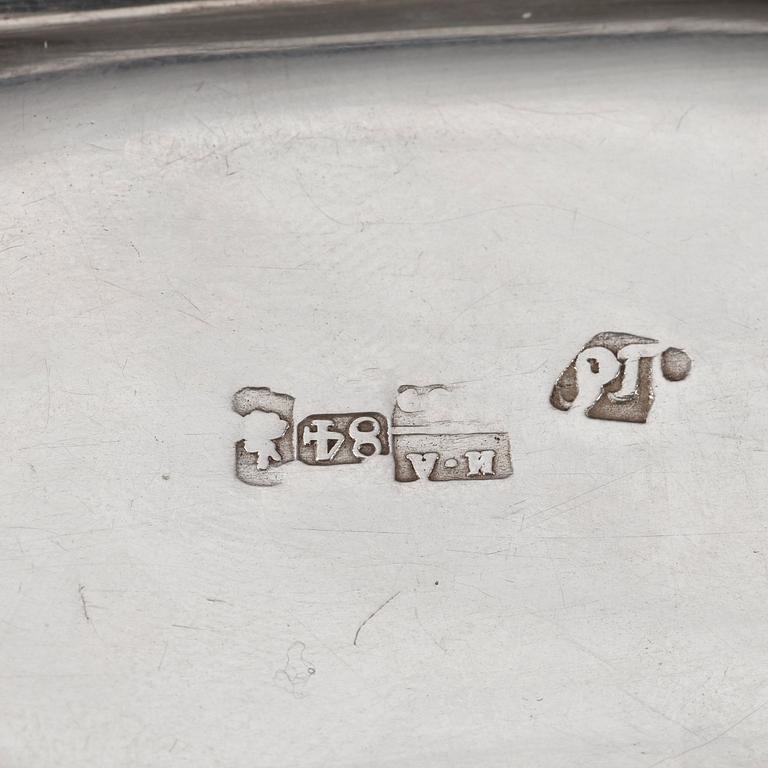 Two Russian mid 19th century parcel-gilt dishes, marked Carl Ekqvist, S:t Petersburg and unidentified maker, Moscow.