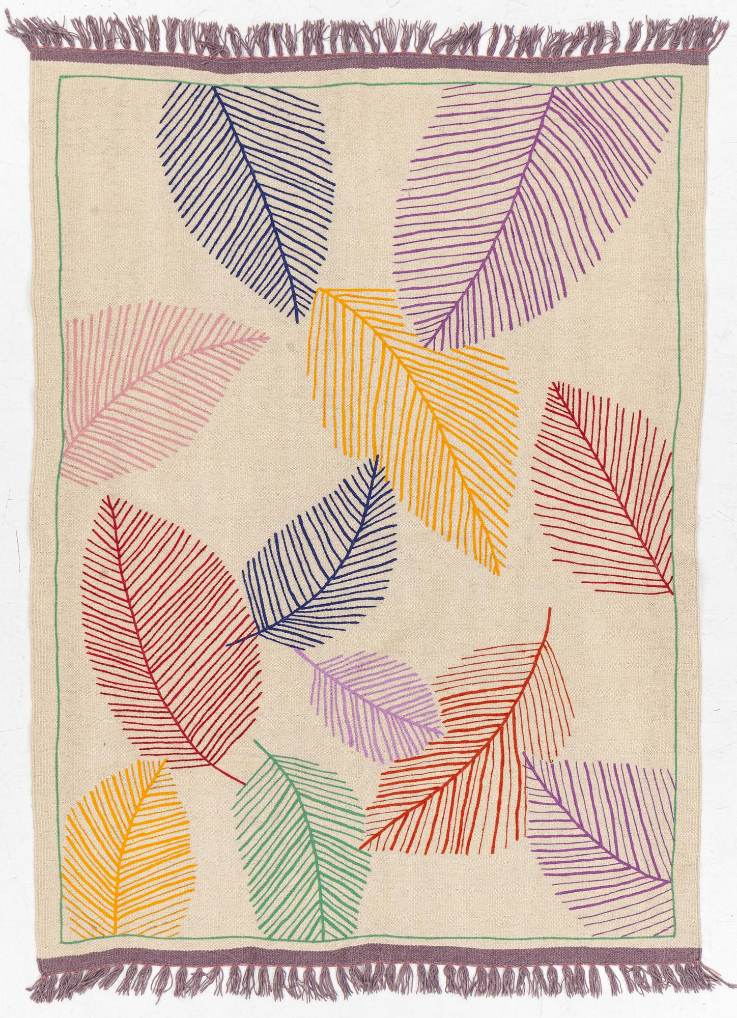 A hand-embroidered Kilim rug, c. 199 x 145 cm.