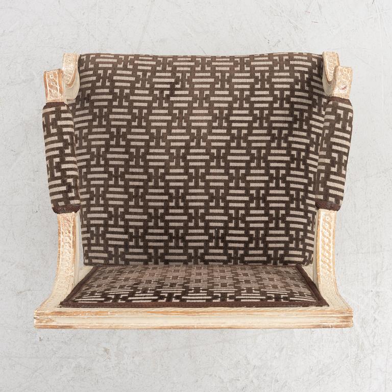 A Gustavian open armchair, Stockholm, late 18th century.