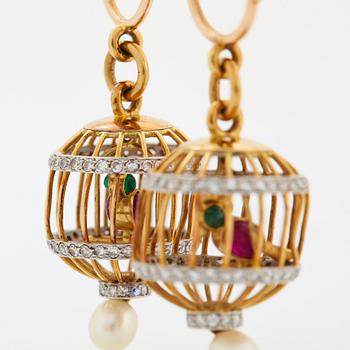 A pair of 18K gold birdcage earrings set with eight-cut diamonds, rubies and emeralds.