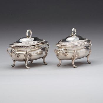 A pair of English 18th century silver sauce-tureens, marks of Sebastian & James Crespell, London 1772.