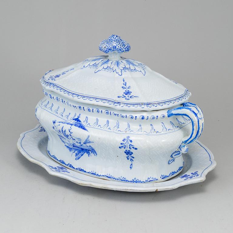 A Swedish Rörstrand faience tureen with cover and stand, 18th Century.