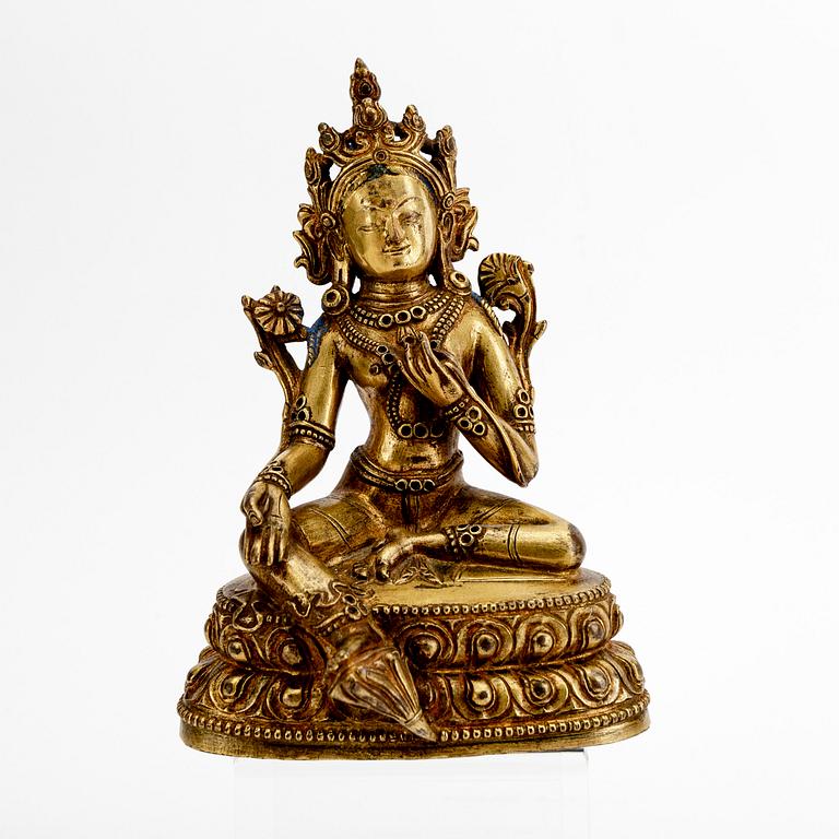 A Tibetochinese patinated bronze Tara figurine 20th century.