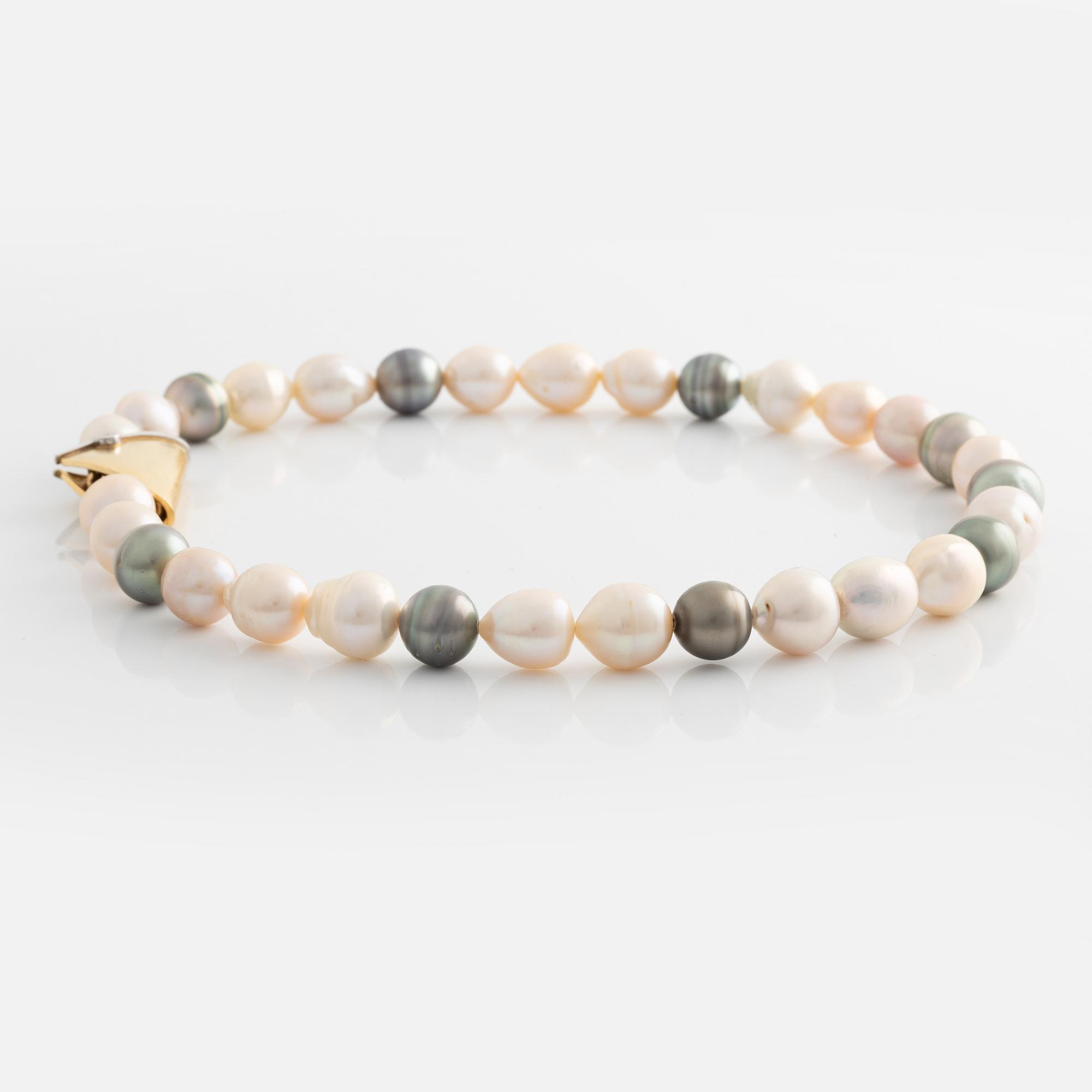 Ole Lynggaard lås 18K guld med en rund briljantslipad diamant.