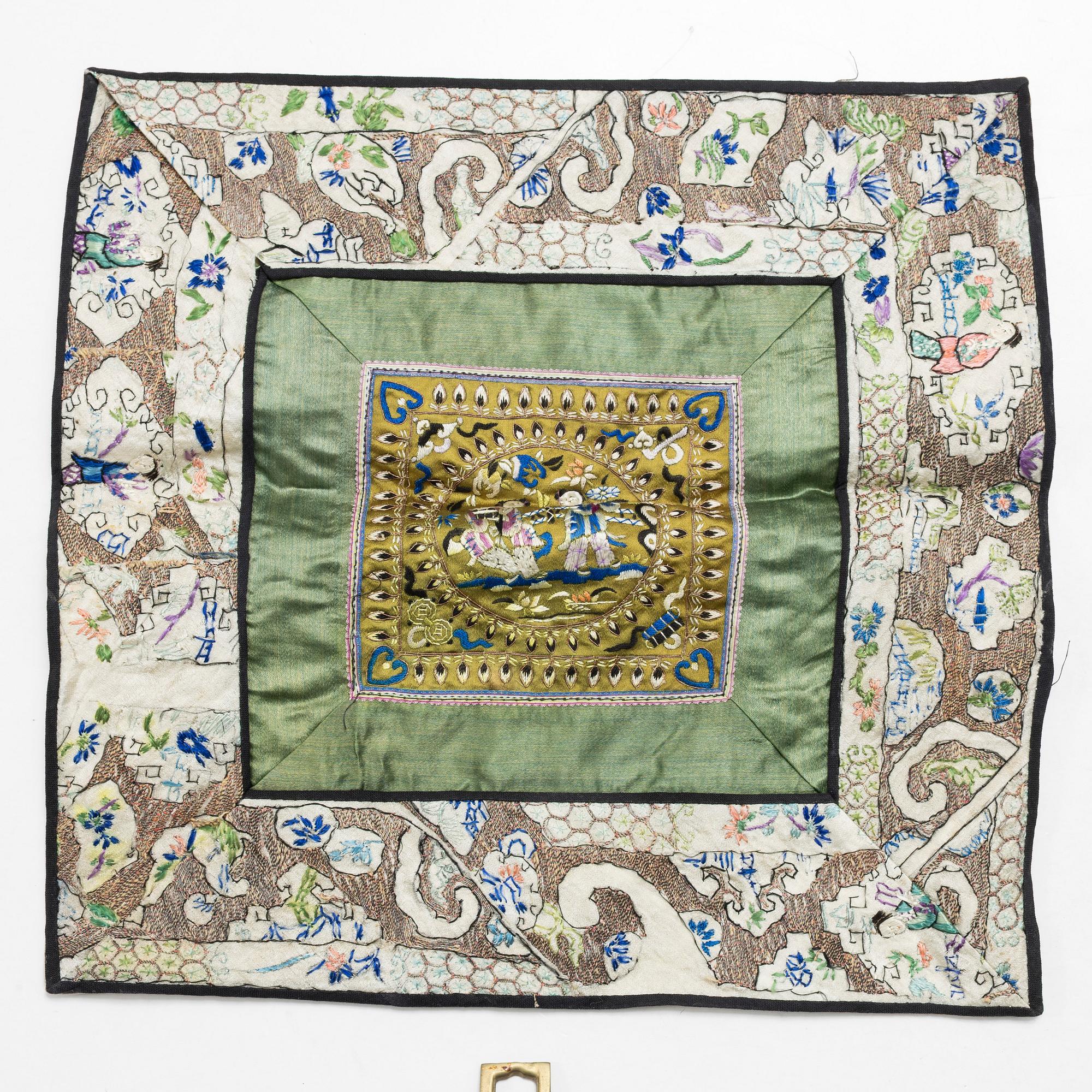 Three Chinese lacquer and wooden panels, two silk embroideries, first half of the 20th century.