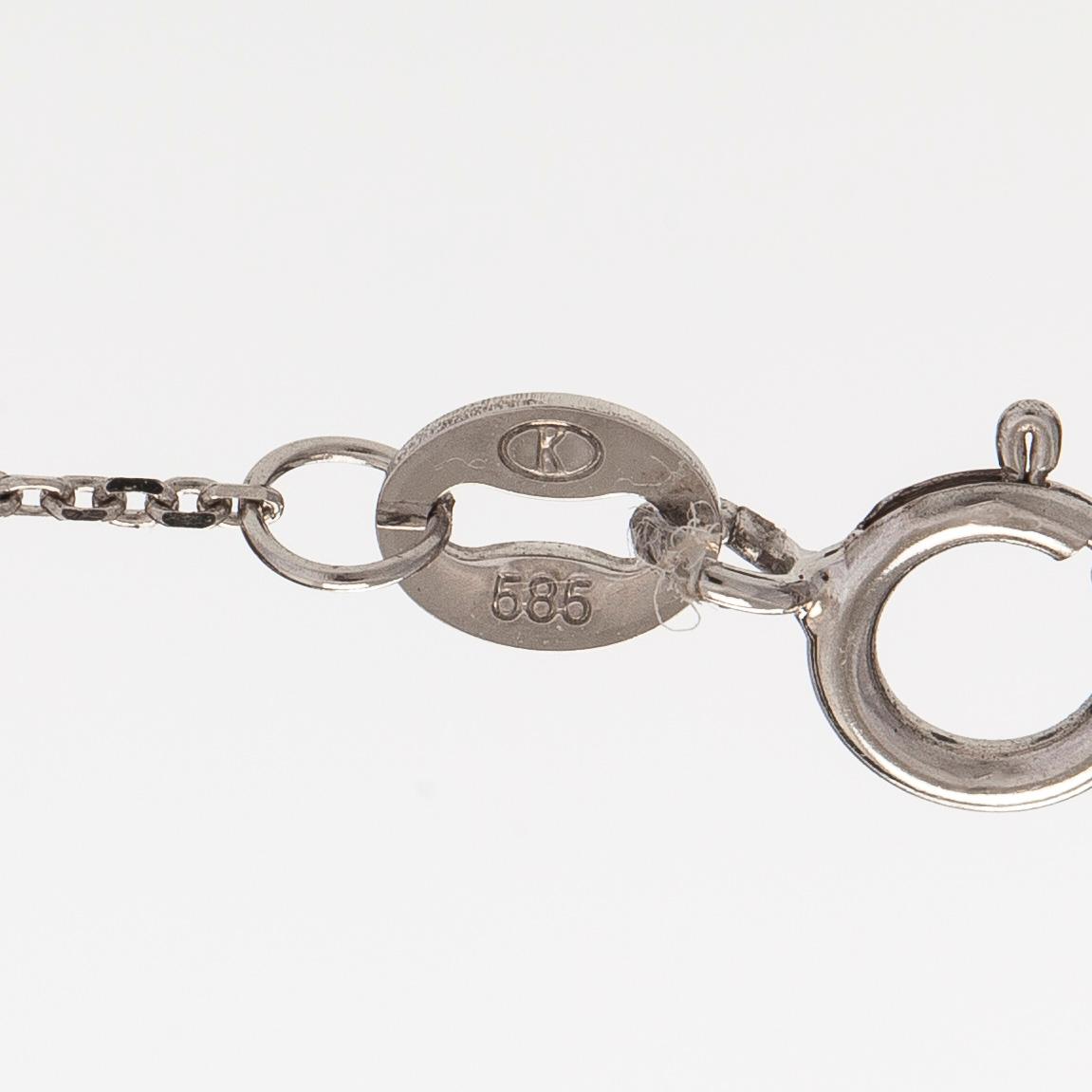 A 14K gold necklace with kunzite and brilliant cut diamonds.