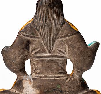 A pottery figure of a the warrior god Guandi, Ming dynasty (1368-1644).