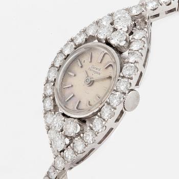 An 18K white gold and brilliant-cut diamond Girard Perregaux ladies watch.