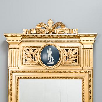 An early 19th century late Neoclassical wall mirror.