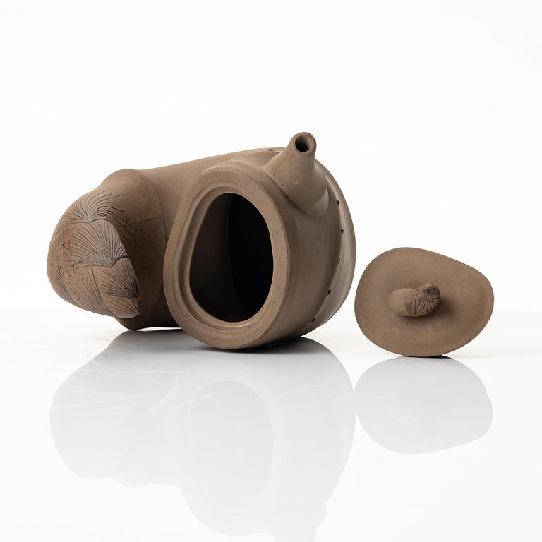 A grey yixing 'bamboo shoot' teapot with six cups, China, 1980s.