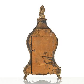 A Rococo-style mantle clock, around 1900.
