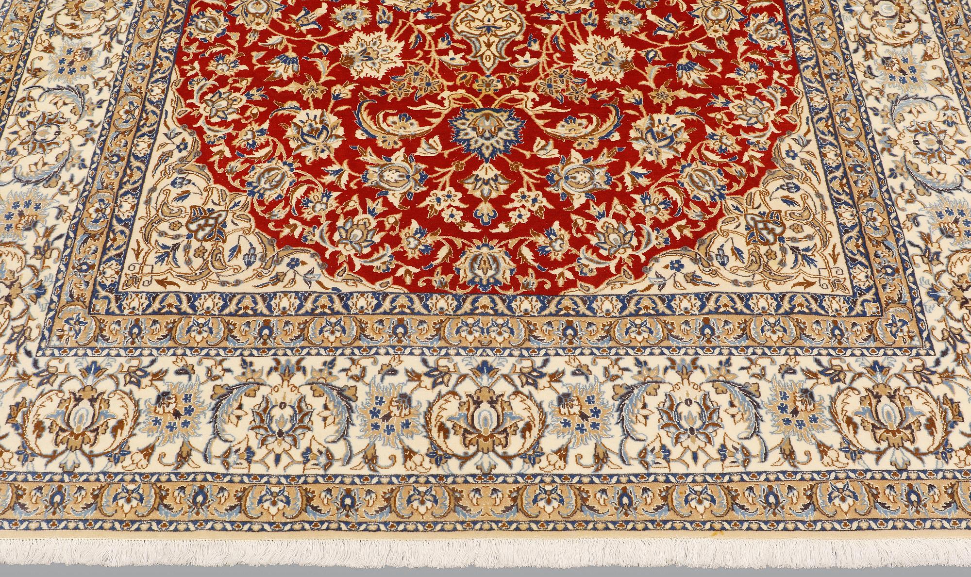 A carpet, Nain part silk so called 9LAA, ca 317 x 202 cm.